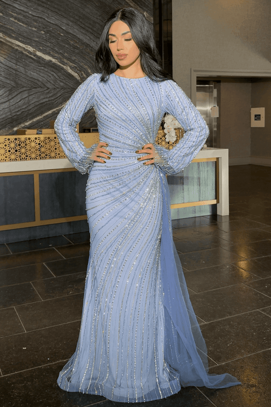 Iyza Belaar Abira sequin modest neckline long sleeve dress with embellished details and side skirt, perfect for elegant occasions.