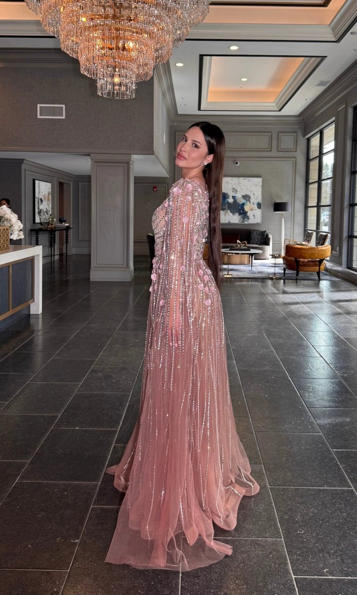 Iyza Belaar Inaya long drape-sleeves beaded A-line gown, elegant evening dress with intricate beadwork and flowing fabric.