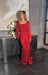 Red beaded modest gown with long drape sleeves by Iyza Belaar, featuring intricate beadwork and elegant design.