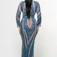 Iyza Belaar Mariam long sleeve beaded dress with intricate beadwork, elegant neckline, and flowing fabric for formal occasions.