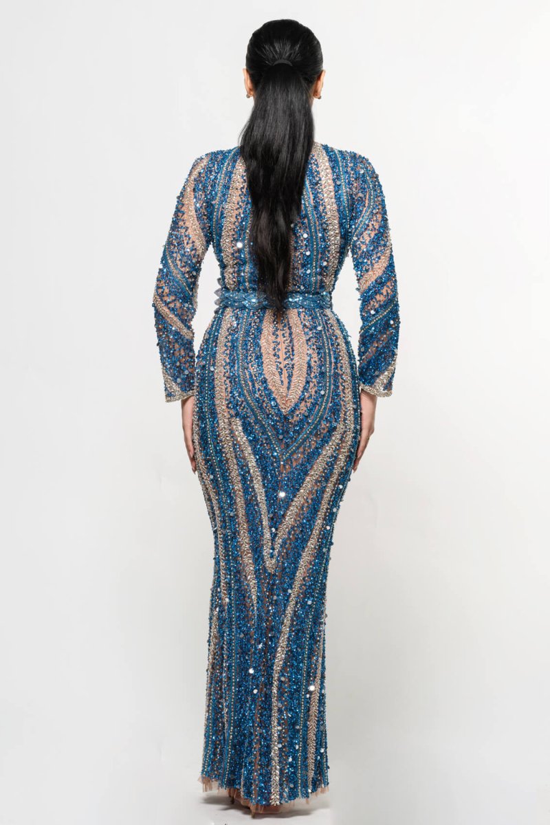 Iyza Belaar Mariam long sleeve beaded dress with intricate beadwork, elegant neckline, and flowing fabric for formal occasions.