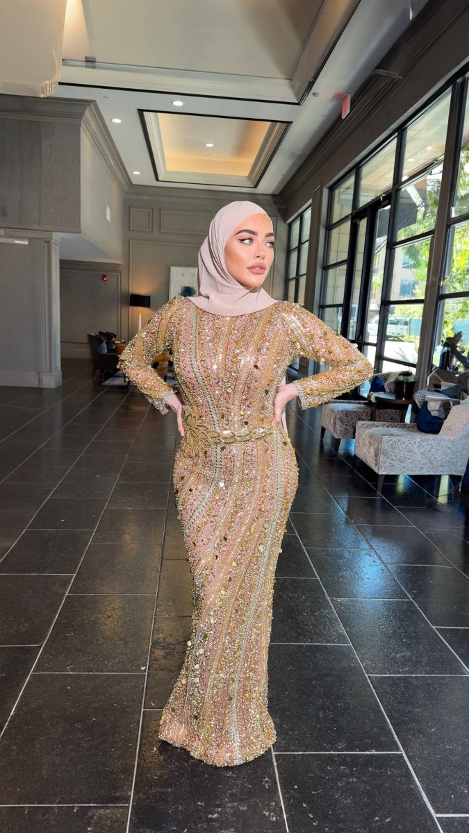 Iyza Belaar Mariam long sleeve beaded dress with intricate beadwork and elegant design, perfect for formal occasions.