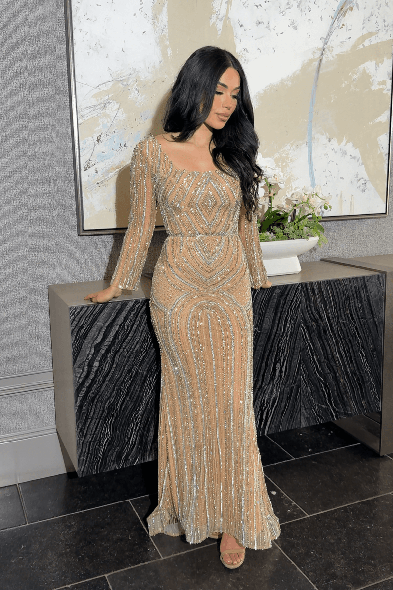 Iyza Belaar Reema sequin embellished long sleeve dress with square neckline, modest style, and intricate detailing.