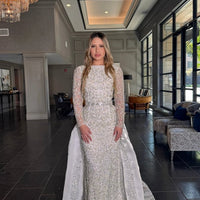 Iyza Belaar Aleena bridal long dress with pearl and crystal embellishments, beaded gown featuring a detachable overskirt.