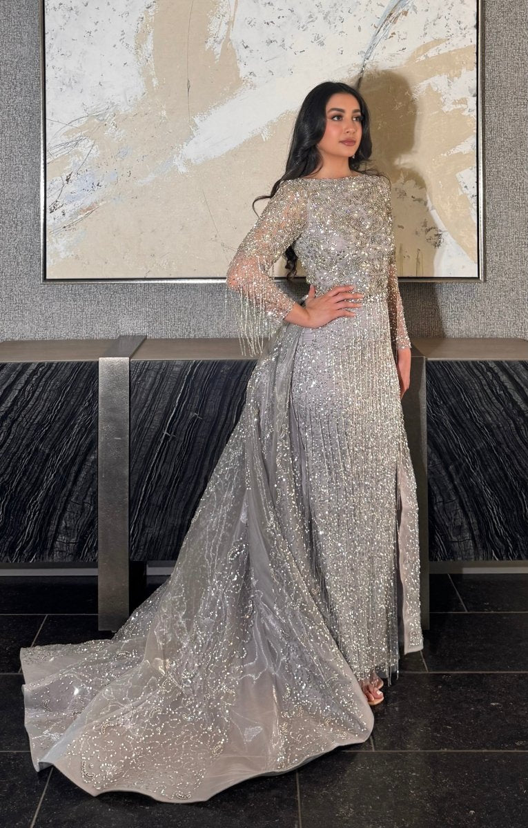 Iyza Belaar Aleya beaded detachable embellished sequin overskirt worn over a long dress, detailed beaded and sequin design, dress not included.