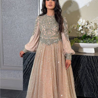 Iyza Belaar Bashira long sleeve embellished sequin modest ball gown with intricate detailing and elegant design.