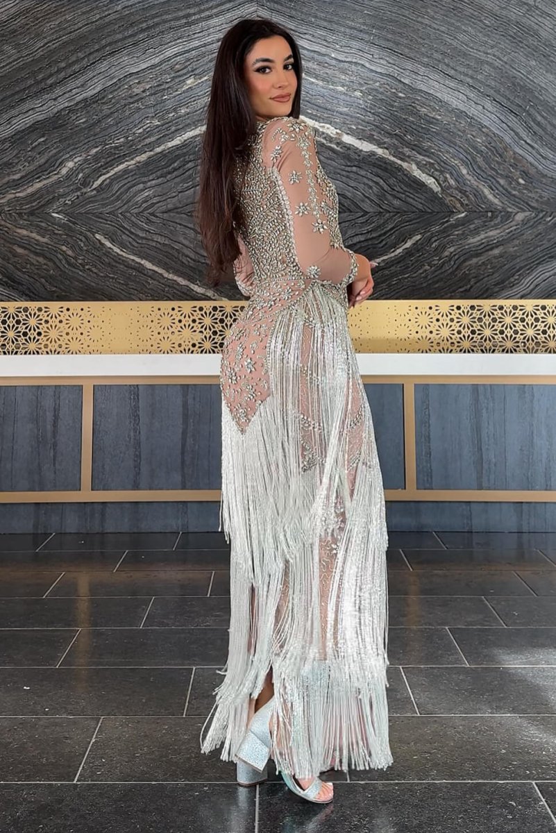 Iyza Belaar Dalia long sleeve beaded sequin modest tassel gown, elegant full-length dress with intricate beadwork and tassel details.