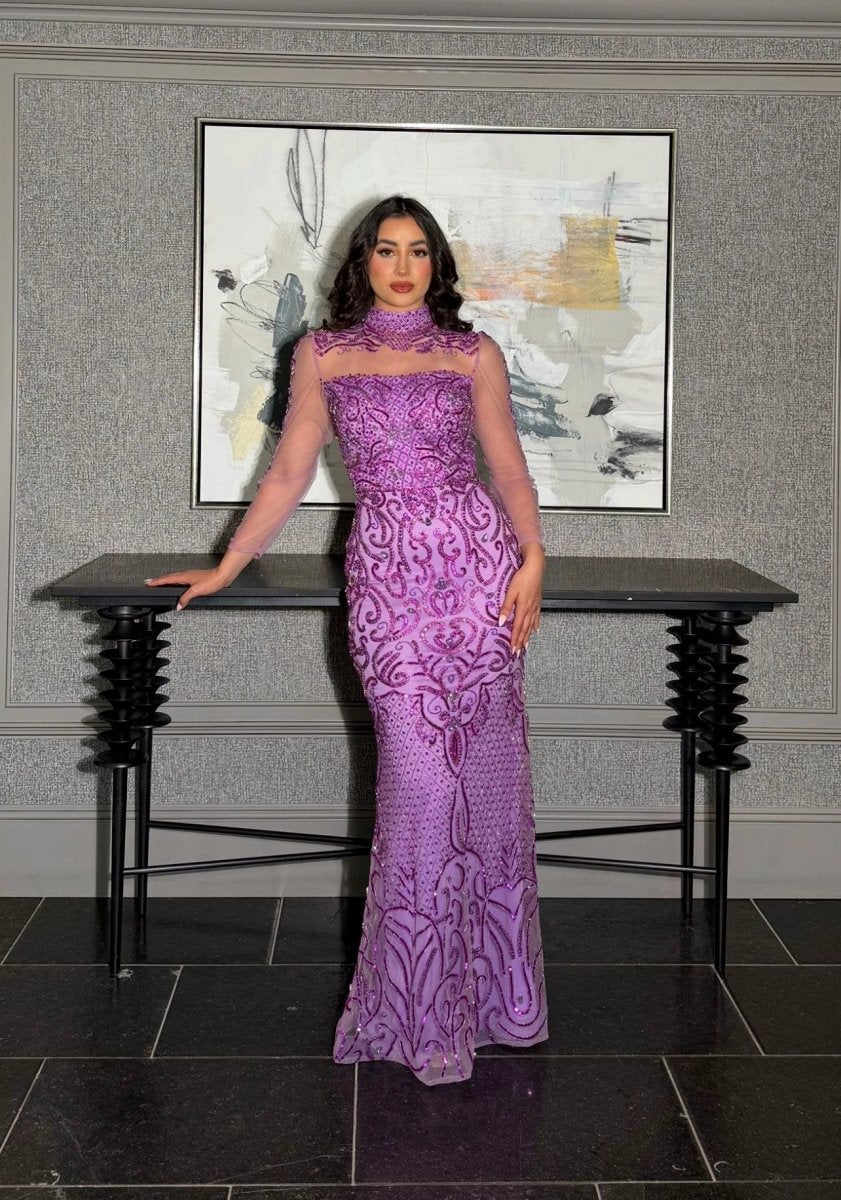 Iyza Belaar Deema long dress with high neckline, tulle fabric, and embroidered details, elegant evening wear for special occasions.