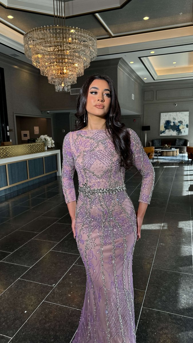 Iyza Belaar Fariza long sleeve evening dress with beaded embellishments and modest design, perfect for formal occasions.