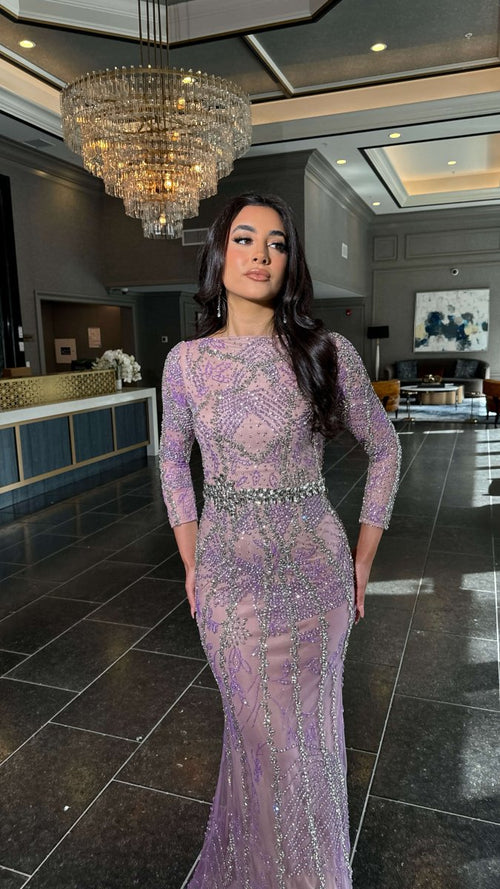 Iyza Belaar Fariza long sleeve evening dress with beaded embellishments and modest design, perfect for formal occasions.