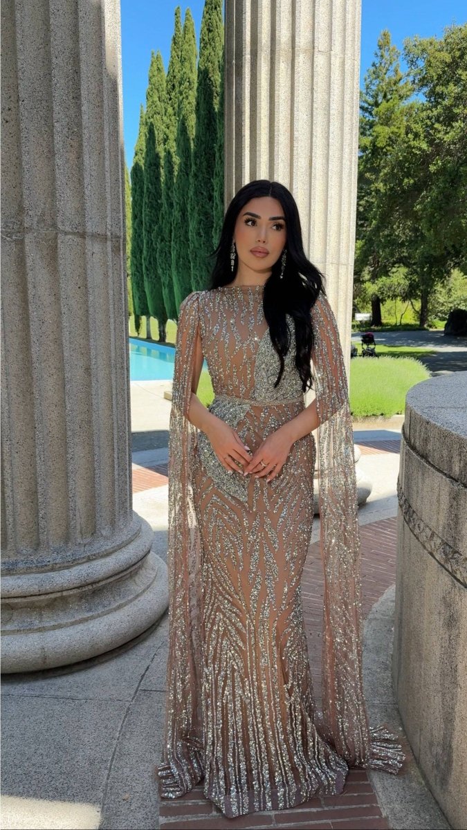 Iyza Belaar Nabilah embellished cape sleeve long dress with intricate embroidery and elegant design, perfect for formal occasions.