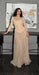 Iyza Belaar Nadine long dress with sparkling ruched detailing and three-quarter sleeves, elegant evening wear.