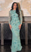 Iyza Belaar Raihana long sleeve high neck floral sequin evening dress with embellishments, modest and elegant for special occasions.