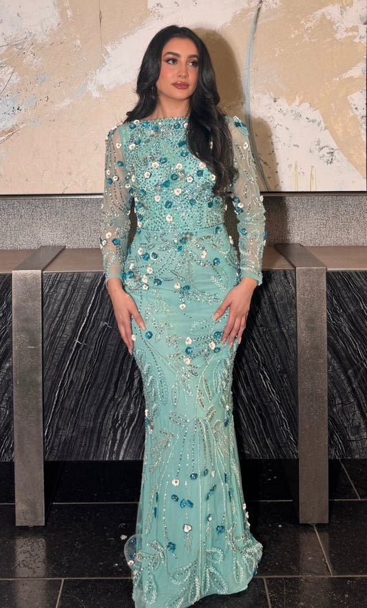Iyza Belaar Raihana long sleeve high neck floral sequin evening dress with embellishments, modest and elegant for special occasions.