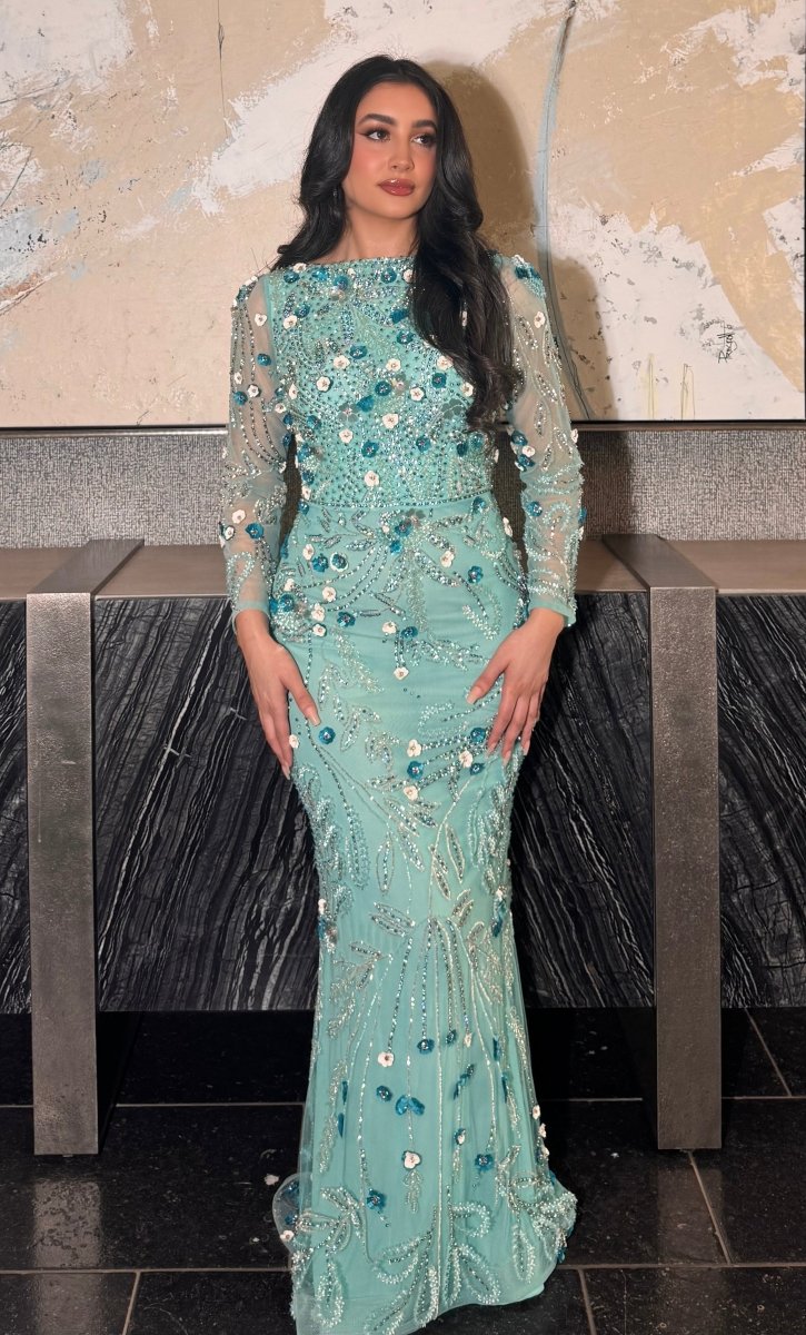 Iyza Belaar Raihana long sleeve high neck floral sequin evening dress with embellishments, modest and elegant for special occasions.