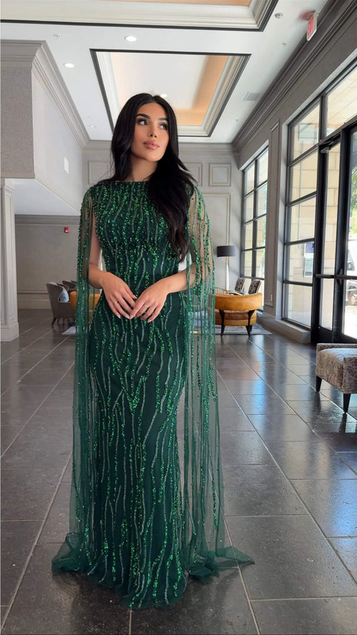 Iyza Belaar Faramah Drape Sleeves embellished fitted sequin evening dress, long modest gown with elegant design and intricate details.