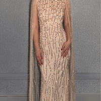 Iyza Belaar Faramah long evening dress with embellished drape sleeves, fitted silhouette, sequins, and modest design.