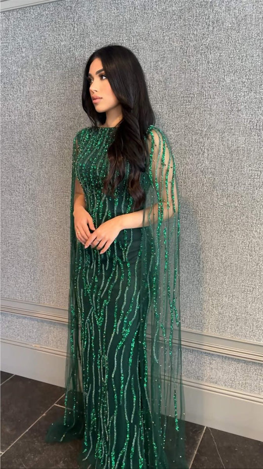 Elegant Faramah Drape Sleeves embellished fitted sequin evening dress by Iyza Belaar, featuring a modest long dress design.