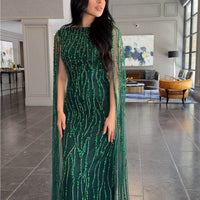 Iyza Belaar Faramah Drape Sleeves embellished fitted sequin evening dress, long modest gown with intricate detailing.