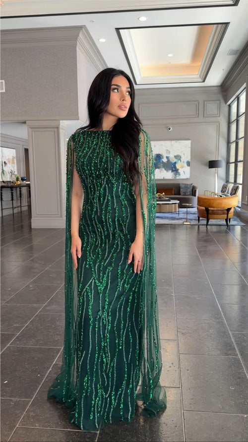 Iyza Belaar Faramah Drape Sleeves embellished fitted sequin evening dress, long modest gown with intricate detailing.