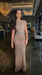 Iyza Belaar Kendall long sleeve beaded dress displayed, featuring intricate beadwork and elegant long dress design.
