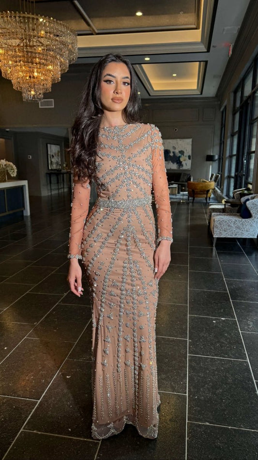 Iyza Belaar Kendall long sleeve beaded dress displayed, featuring intricate beadwork and elegant long dress design.