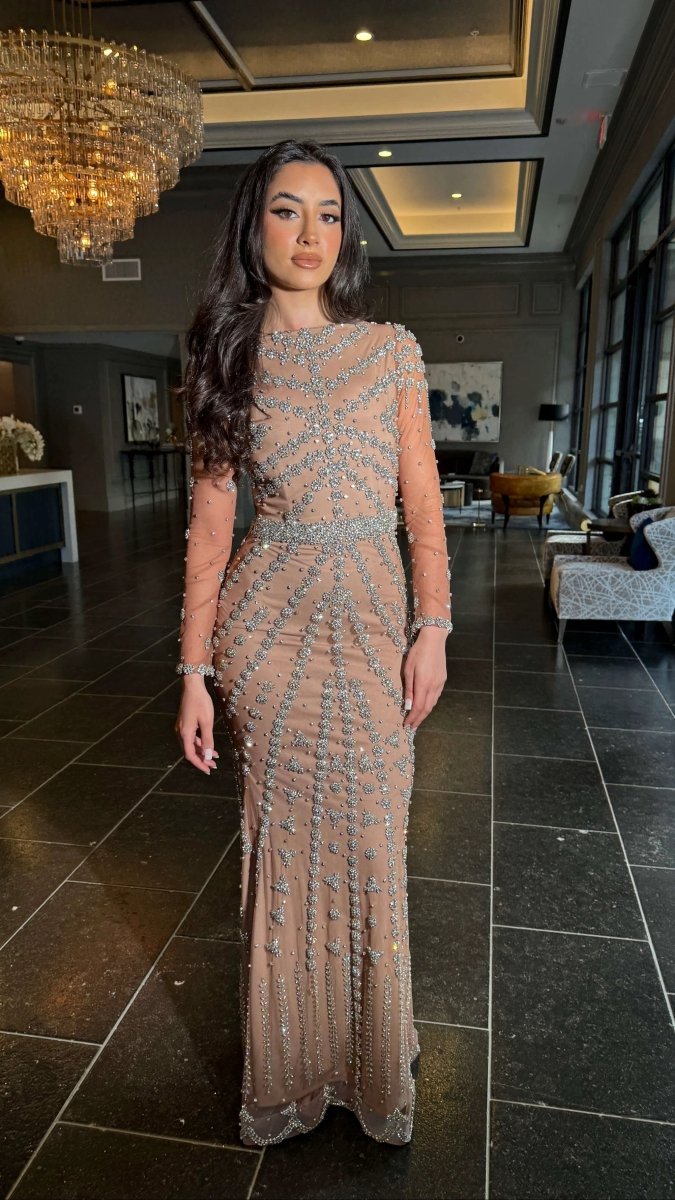 Iyza Belaar Kendall long sleeve beaded dress displayed, featuring intricate beadwork and elegant long dress design.