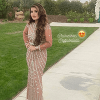 Iyza Belaar Kendall long sleeve beaded dress, elegant long dress with intricate beadwork and a fitted silhouette.