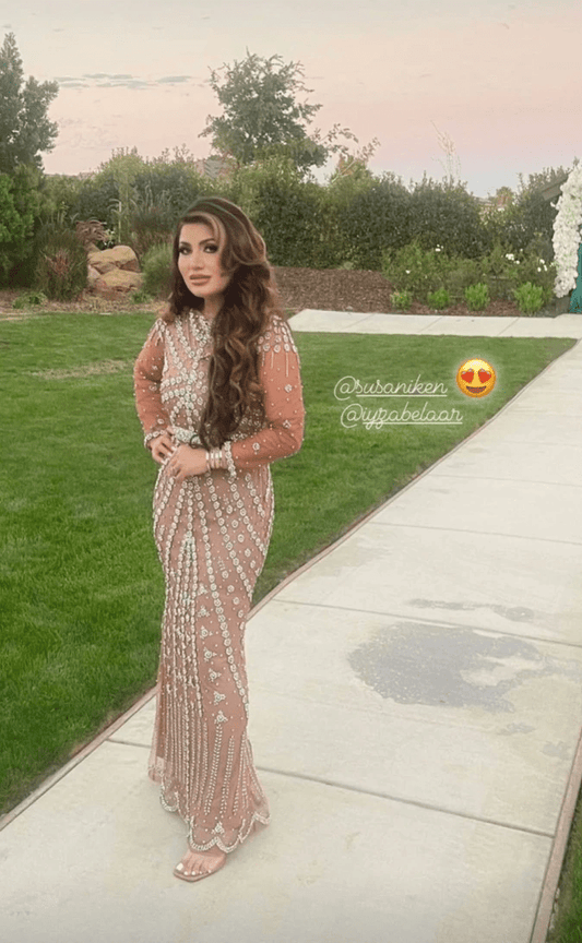 Iyza Belaar Kendall long sleeve beaded dress, elegant long dress with intricate beadwork and a fitted silhouette.
