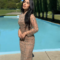 Iyza Belaar Sahara embellished silver beaded modest long sleeve dress, featuring intricate beadwork and elegant design.