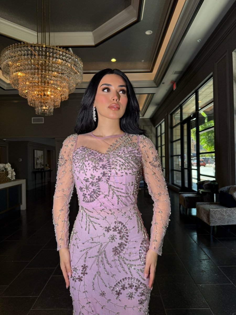 Iyza Belaar Moral Modest Long Sleeve Flower Mermaid Gown, elegant long sleeve dress with floral pattern and fitted mermaid silhouette.