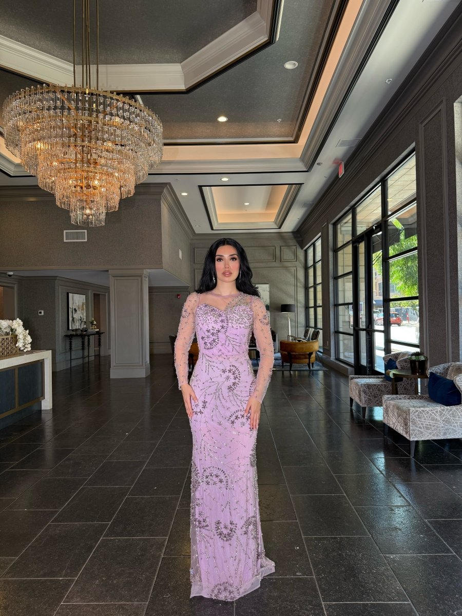 Iyza Belaar moral modest long sleeve flower mermaid gown, elegant evening dress with floral pattern and fitted silhouette.