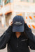 Navy blue Ansiosa & Deshidratada cap by JZD, featuring a curved brim and adjustable strap, shown on a plain background.