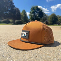 Little Rad Things waterproof age snapback hat in chestnut, showing a close-up of the brown, durable hat with adjustable strap.