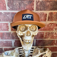 Little Rad Things waterproof age snapback hat in chestnut color, featuring adjustable strap and breathable fabric.