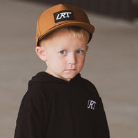 Little Rad Things waterproof age snapback hat in chestnut color, featuring a durable, stylish design for kids.