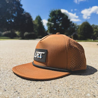 Waterproof age snapback hat in chestnut color by Little Rad Things, featuring a classic design and adjustable strap.