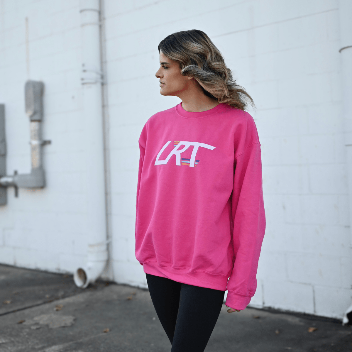 Adult Little Rad Things winged logo crew sweatshirt, casual shirt with a winged logo design, made for comfort and style.