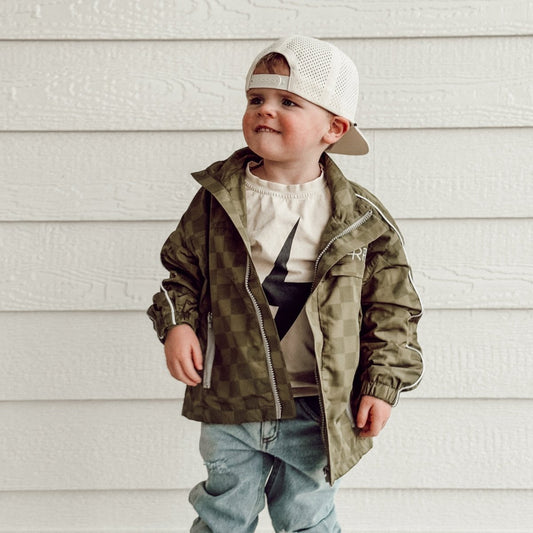 Little Rad Things Storm Rider waterproof jacket in army green, lightweight and weather-resistant for outdoor wear.