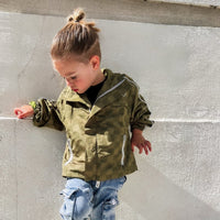 Little Rad Things Storm Rider waterproof jacket in army green, with hood and zipper, designed for outdoor protection.