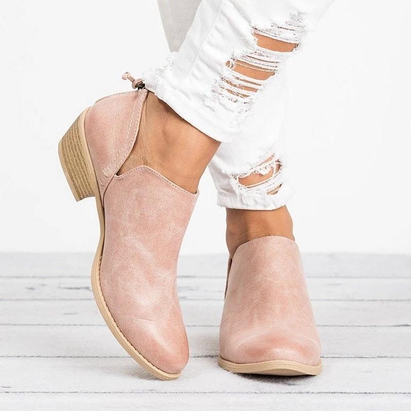 Mandotos women's autumn ankle boots with retro high heels, stylish leather design and ankle-length fit.