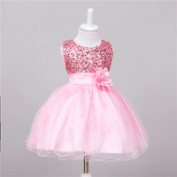 Baby sequin dress by MANDOTOS featuring flower girl or princess style, with shimmering sequins and delicate design for special occasions.