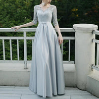 Elegant black evening dress for women by MANDOTOS, suitable for banquets and parties, featuring a stylish, flowing design.