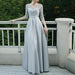 Elegant black evening dress for women by MANDOTOS, suitable for banquets and parties, featuring a stylish, flowing design.