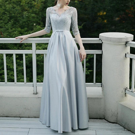 Elegant black evening dress for women by MANDOTOS, suitable for banquets and parties, featuring a stylish, flowing design.