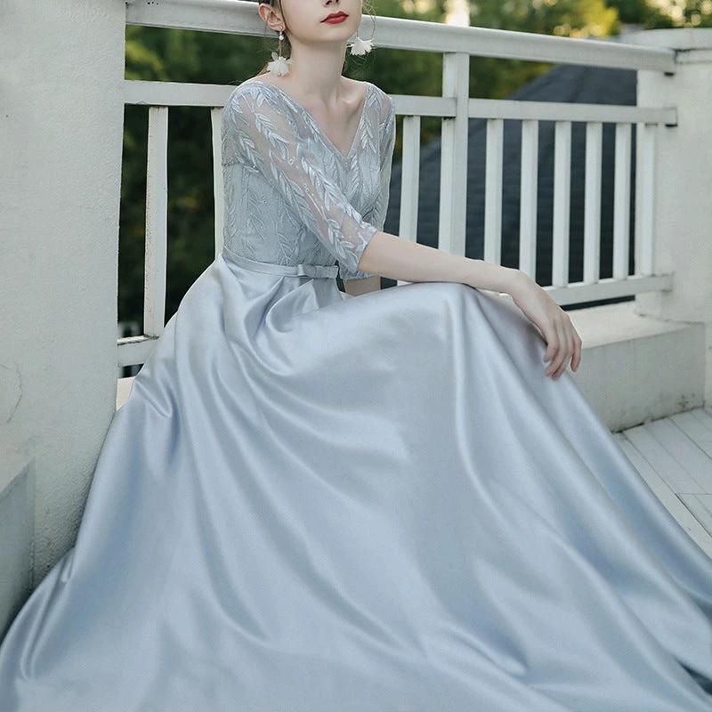 Elegant women's evening dress by MANDOTOS, suitable for banquets and parties, featuring a sleek, sophisticated design.