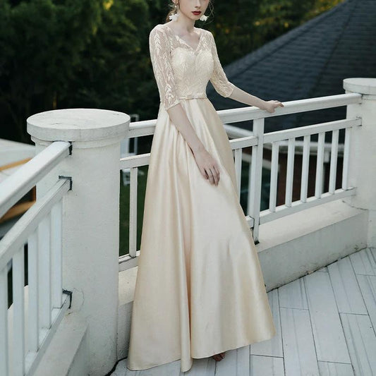 Elegant evening dress for women by MANDOTOS, featuring a stylish banquet party design with intricate details and flowing fabric.