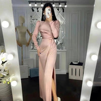 Mandotos waist-fitting irregular dress featuring a stylish, flowy design with a unique silhouette and elegant details.