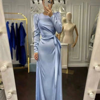 Mandotos waist-fitting irregular dress featuring a stylish design, showcased on a model highlighting its unique silhouette.