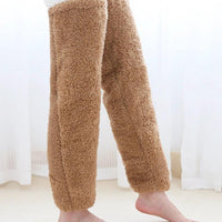 Mandotos cozy winter knee-high fuzzy socks for cold-proof comfort, soft and warm, ideal for cold weather.